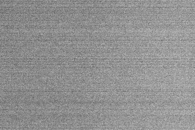 The whole sensor of one bias frame, averaged in 8 by 8 blocks and stretched hard: an even mid-grey with fine texture and no gradient, no bright edge and no glowing corner